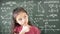 Girl thinking about mathematics problem