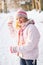 Girl About To Throw Snowball In Snowy Woodland