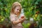 Girl and tomato harvest