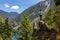 Girl on Top of Cliff with Beautiful View of Canadian Mountain Landscape