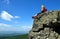 Girl at the top of Grosser Arber mountain in National park Bayerische Wald, Germany.