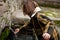 Girl touching water from a natural fountain