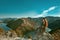 Girl tourist enjoying and sightseeing amazing view of Rijeka Crnojevica, Montenegro. Skadar lake national park, Pavlova Strana. V