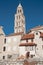 Girl tourist enjoying and sightseeing Marble ancient roman architecture in city center of town Split, view cathedral Saint