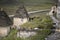 A girl tourist walks through the ancient village of Dargavs - the City of the Dead