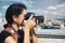 Girl traveler photographer taking pictures of landscapes of istanbul