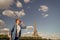 Girl traveler smile at eiffel tower in paris, france