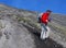 Girl trekking on Etna volcano