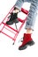Girl in trendy black and red leather boots posing on the stairs in the studio on a white background. shooting the catalog of fashi