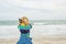 Girl and two dogs on the beach. Woman and two chihuahua dogs by the sea