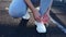 Girl tying her shoelaces on the running ground,