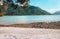 Girl with Umbrella on Tranquil Island under Blue Sky