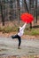 Girl and umbrella on a windy day