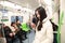 Girl uses mobile phone while travel by subway,Woman using her cell phone in Subway