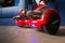 Girl using a red self-balancing two-wheeled board. The gyroscope based dual wheel electric s