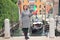 Girl in Venice on the weekend. Woman travels in Italy. Young woman with italian flag on venetian canal