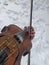 girl violinist plays outdoors in winter when there is snow