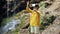 Girl virtual reality glasses VR sunny day wildlife woman raising hands peaks mountains, waterfall, forest electronic