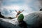 Girl wakesurfer glides smoothly on a board