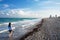 Girl walk at the sunny South Beach of Miami