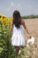 Girl walking in a cropland