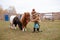 Girl Walking With Cute Little Ponies