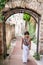 Girl walking downhill  street in Ventimiglia