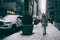 Girl walking on famous new york avenue.