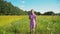 Girl walking on the field.