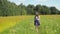 Girl walking on the field.