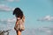 Girl walking on the grass of lighthouse in Havana Fort in Havana, Cuba