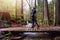 Girl Walking on a Mystical Trail in Rain Forest