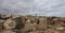 Girl walking over the Son Real Archaeological Site in the north coast of the island of mallorca,