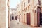 Girl walking at the streets of old Arabian town in Dubai, UAE