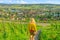 Girl walking in Swiss vineyards
