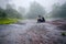 Girl walking traveling adventure nature in the rain forest. travel nature, Travel relax, Travel Thailand, rainy season. Phu Hin