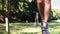 Girl walks over an obstacle on a workout playground