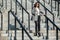 Girl walks on stair