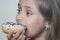 Girl want to eat sweet donuts. Happy pretty girl with donuts having fun. Portrait of joyful girl with donuts . diet concept