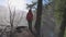 Girl watching a beautiful waterfall in Canadian Nature