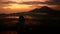 Girl watching sunrise over Lake Batur, Volcano Agung and Abang, Bali, Indonesia