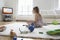 Girl Watching TV With Toys On Floor