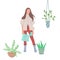 Girl watering flowers in a pot. Creating favorable conditions in a greenhouse, room or public premises for growing indoor plants