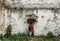 Girl wearing an autumn outfit and exploring the old and unique pictures of Croatia