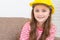 Girl wearing Engineering safety hat.