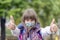 Girl wearing face mask during corona virus and flu outbreak.