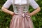 girl wearing a luxury traditional Bavarian dirndl dress (Tracht) (Munich, Bavaria, Germany)