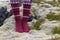 Girl wearing red Icelandic wool socks standing in.