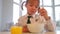 Girl Wearing School Uniform Eating Breakfast Cereal