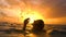 girl with wet hair and lips in the sunset in the water underwater